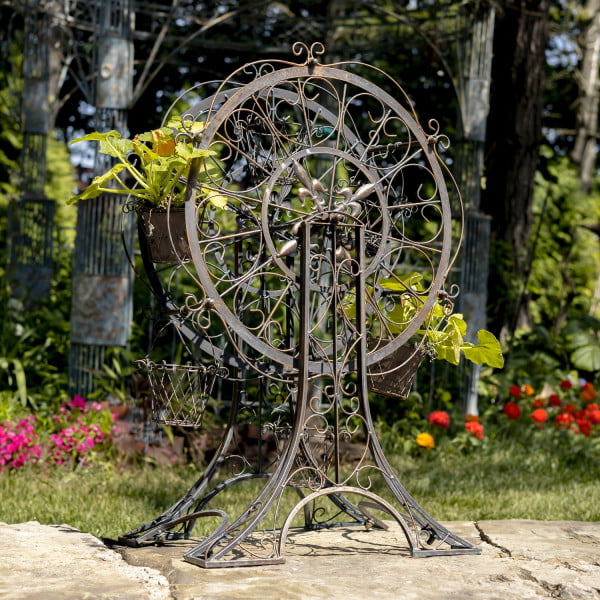 38 inches tall iron ferris wheel plant stand with 6 baskets in distressed antique bronze finish in garden