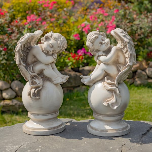 Set of Two 21 Tall Magnesium Cherubs Sitting on Globe Pedestals Yael & Cael