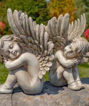 Pair of 2 20 inch tall sitting cherubs in antique grey finish