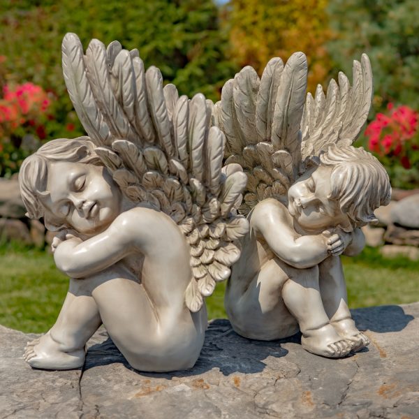 Pair of 2 20 inch tall sitting cherubs in antique grey finish