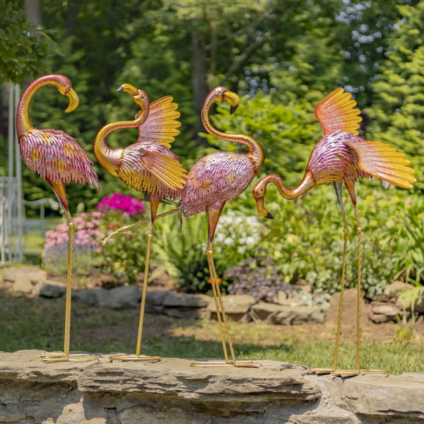 Set of 4 metallic pink flamingo outdoor decorations in 4 assorted styles in garden