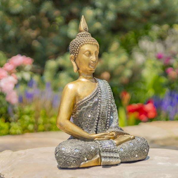 Meditative Buddha Statue in garden