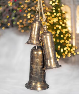 three-piece iron bell cluster in assorted sizes and shapes in gold finish hanging on rope