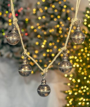 assorted five-piece metal bells hanging decorations on rope in antique gold finish