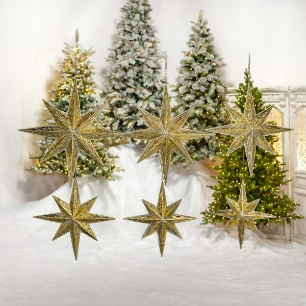 set of 6 three-dimensional North Star hanging iron decorations in assorted sizes painted in gold