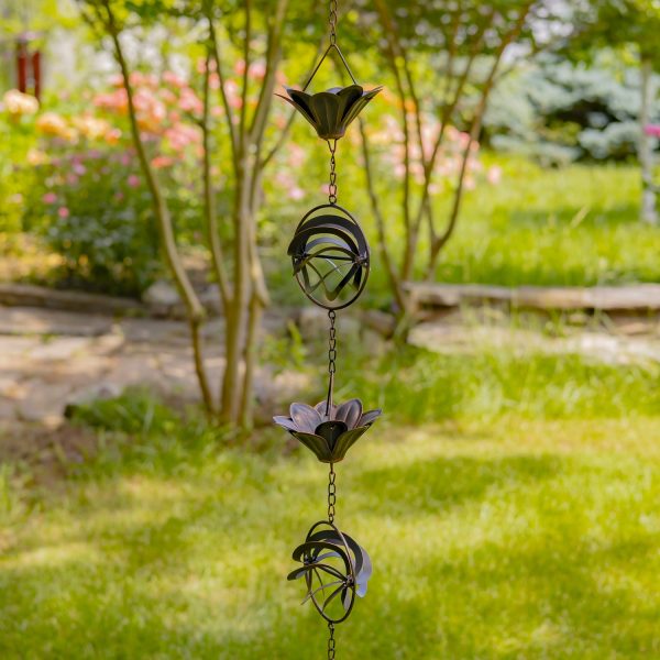 iron rain chain with lilies and abstract globe accents in antique bronze finish