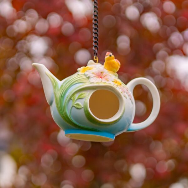 Crafted with exceptional quality, these unique birdhouses showcase intricate hand-painted designs and beautifully textured porcelain.