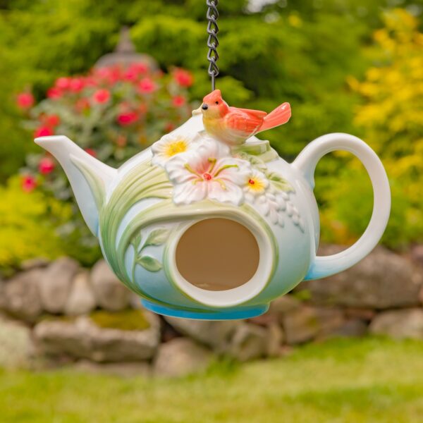 Crafted with exceptional quality, these unique birdhouses showcase intricate hand-painted designs and beautifully textured porcelain.