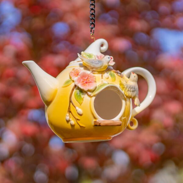 Crafted with exceptional quality, these unique birdhouses showcase intricate hand-painted designs and beautifully textured porcelain