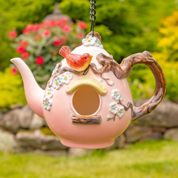 Crafted with exceptional quality, these unique birdhouses showcase intricate hand-painted designs and beautifully textured porcelain
