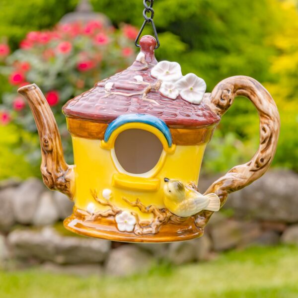 these unique birdhouses showcase intricate hand-painted designs and beautifully textured porcelain