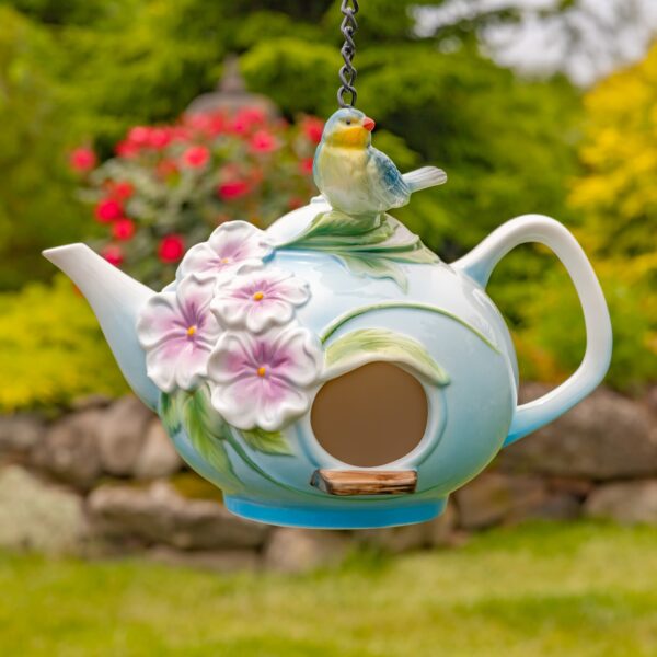 Crafted with exceptional quality, these unique birdhouses showcase intricate hand-painted designs and beautifully textured porcelain