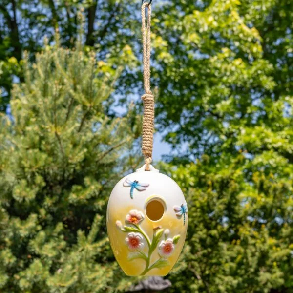 The Merryweather style features a pale yellow ombré base with hand painted blue dragonflies.