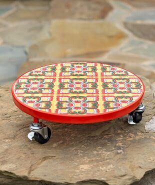 Round metal plant trolley with colorful mosaic tiles and red frame.