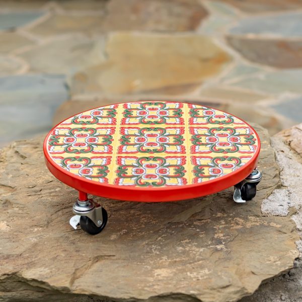 Round metal plant trolley with colorful mosaic tiles and red frame.