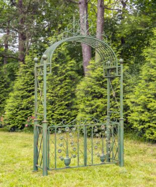 Iron garden gate in antique green with floral embellishments in green