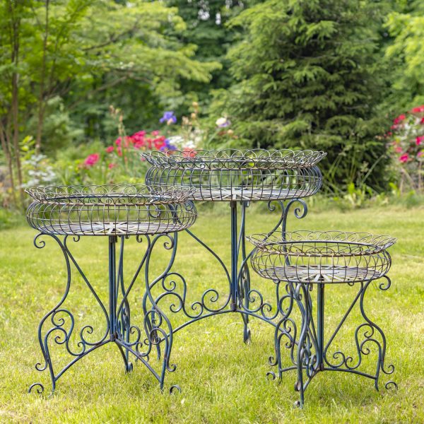 set of 3 iron plant stands with baskets and iron detail in a cobalt blue finish