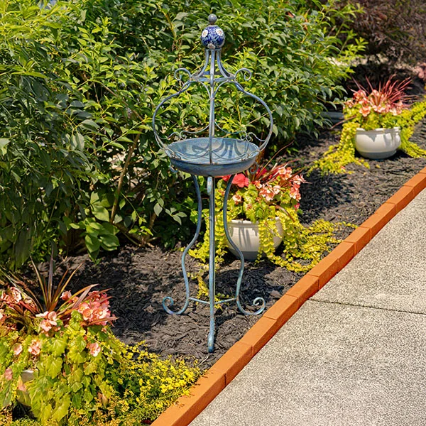 45In. Tall Iron Birdbath with Ceramic Sailor Ball Accent