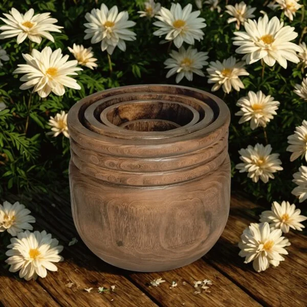 image of four round wooden planters with a rustic background